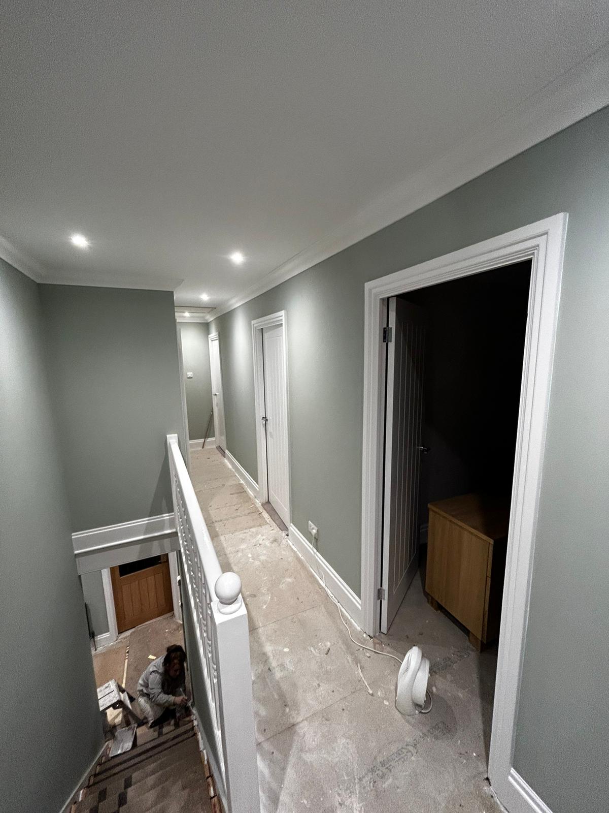 Corridor wall painting with neutral tones