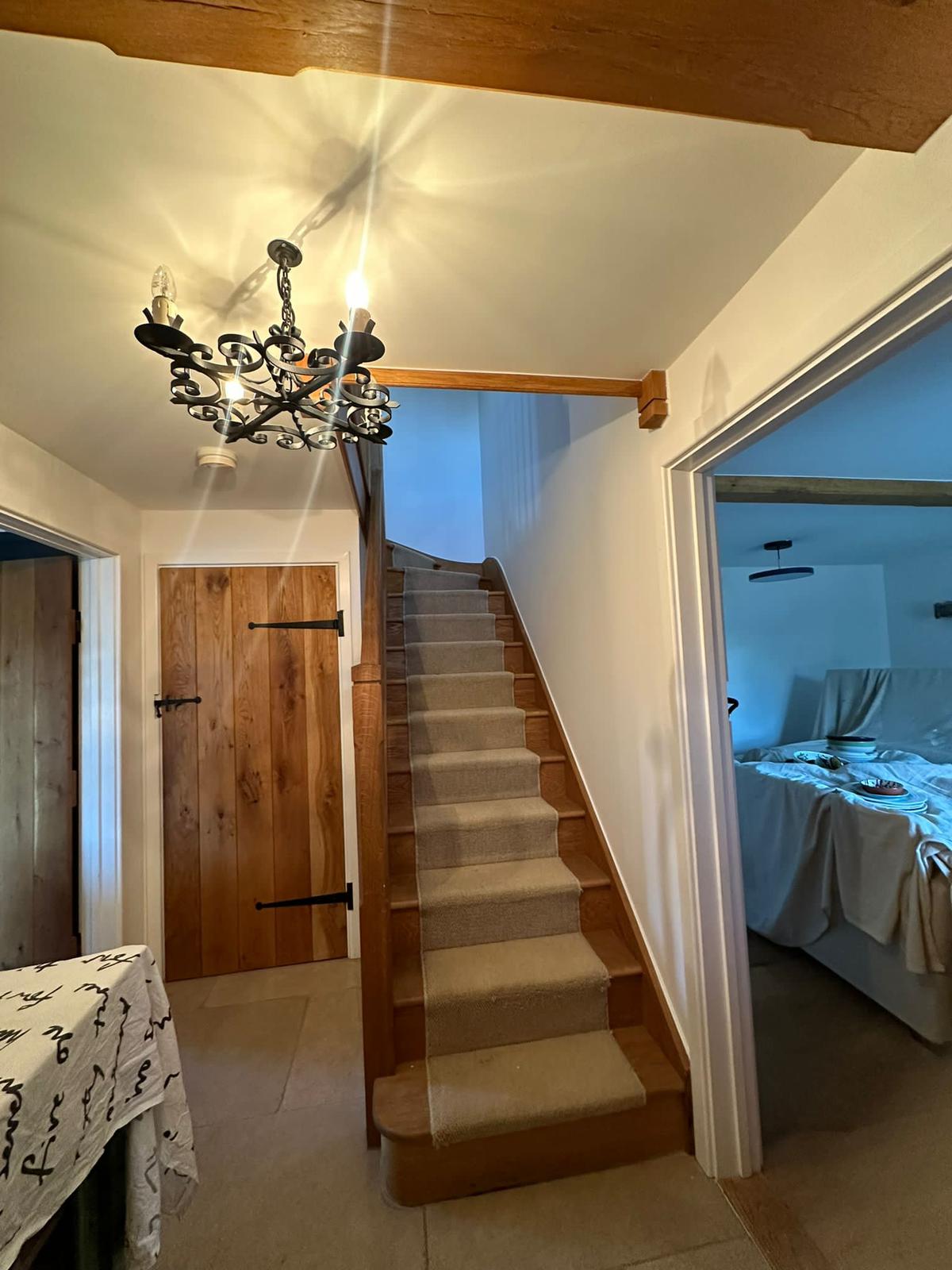 Stairwell painting and trim work in Witney home